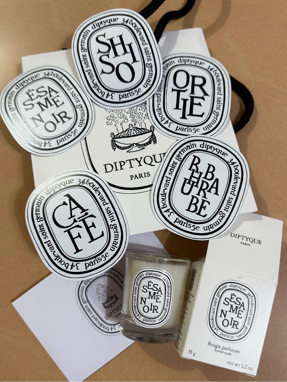 diptyque Sesame Noir Candle with Branded Black & White Tags